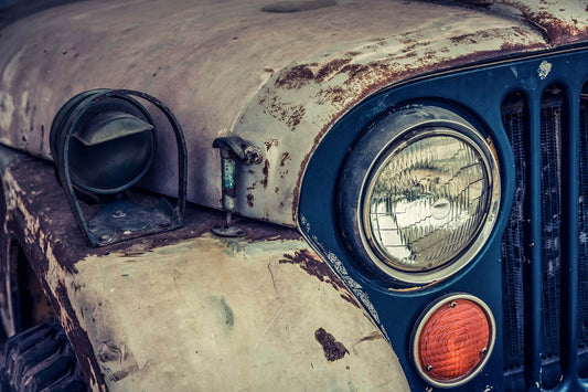 This image shows a textured, rusty metallic body surface of a 4x4 truck jeep